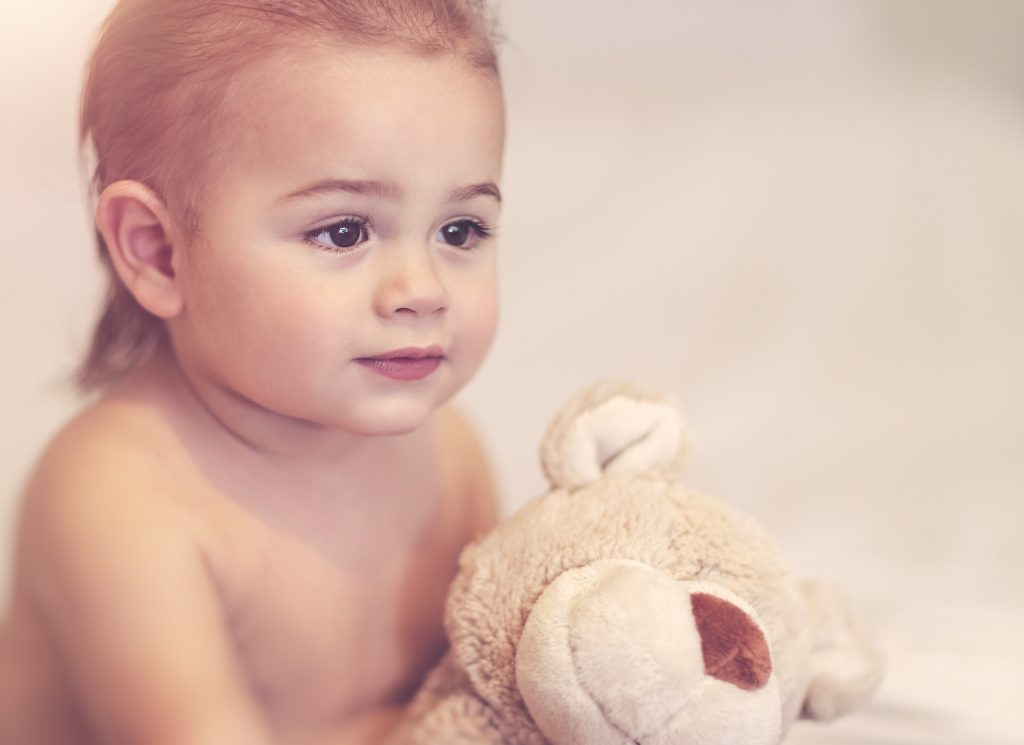 Little boy with soft toy